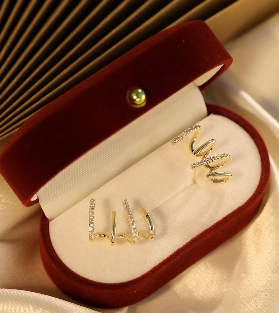 Øredobber som Omslutter Øret