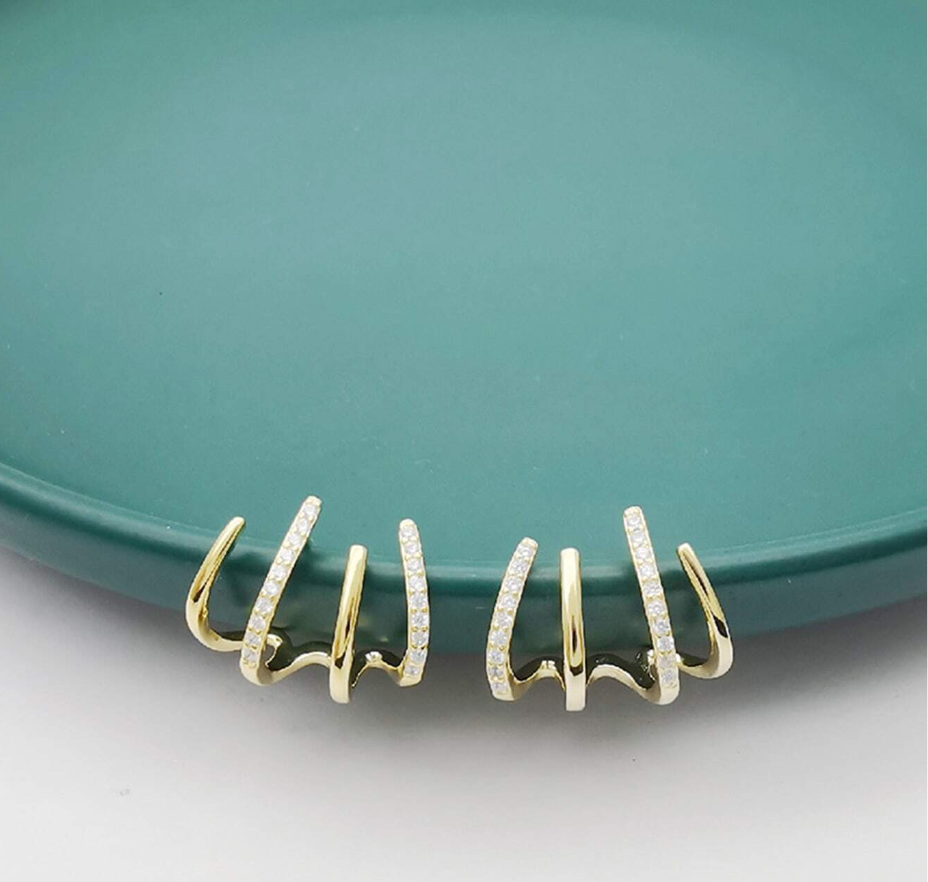 Øredobber som Omslutter Øret