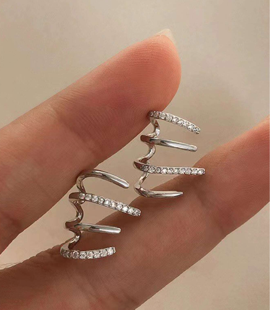 Øredobber som Omslutter Øret