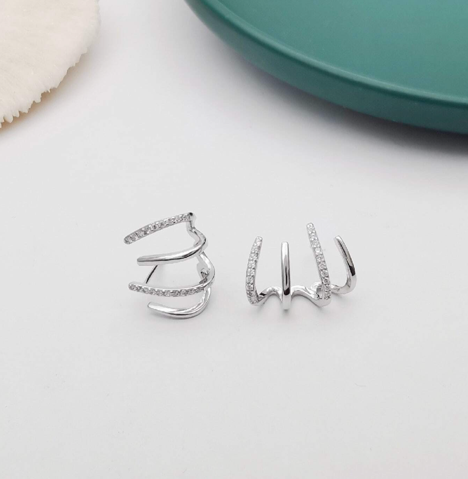 Øredobber som Omslutter Øret