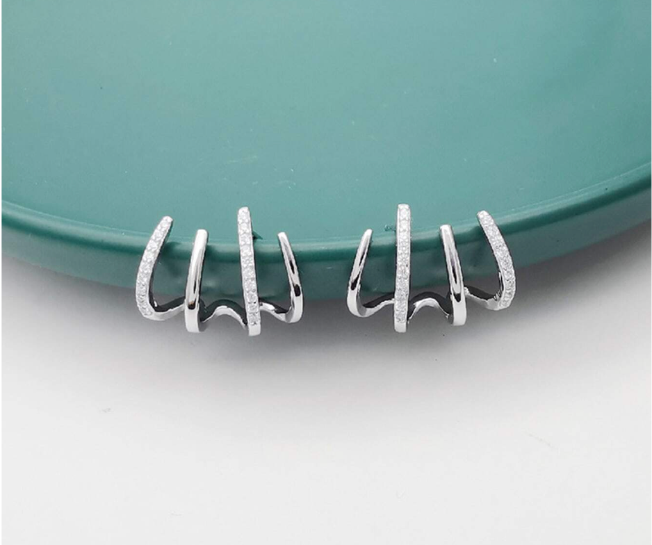 Øredobber som Omslutter Øret