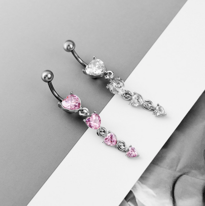 Navlepiercing med hengende diamanter
